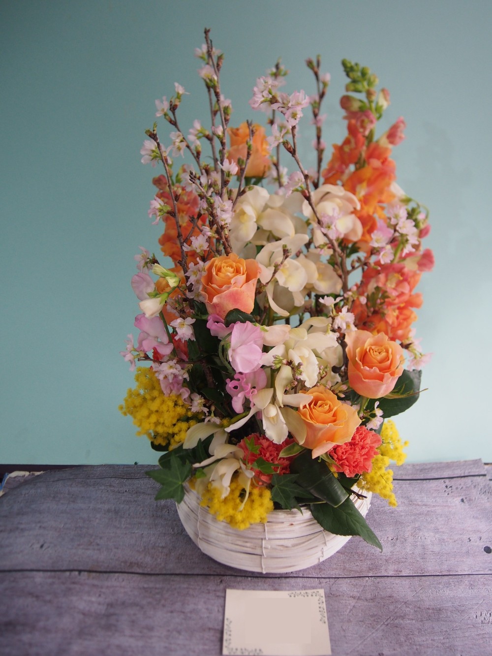 季節のお花でお作りした傘寿 祝い花