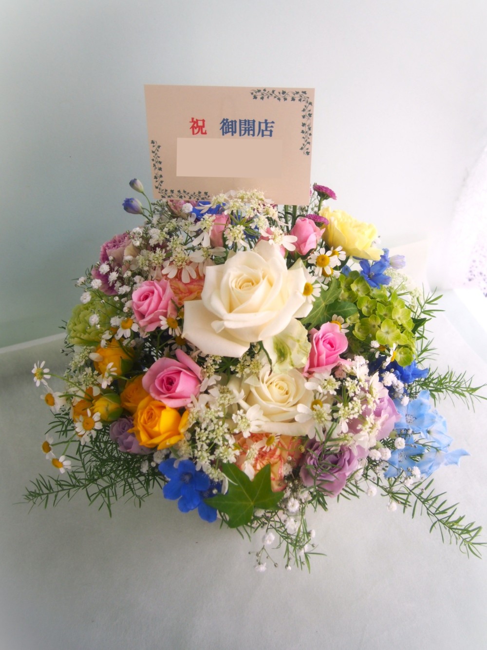 優しい色彩に想いを込めた 季節のご開店祝い花