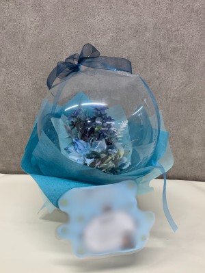 ブルーを基調に上品におつくりした ご出演祝い花・楽屋花